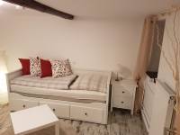 Einzelzimmer mit ausziehbarem Bett